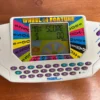 Vintage 1995 Tiger Electronics Wheel of Fortune Handheld Game w/ Cartridge 9